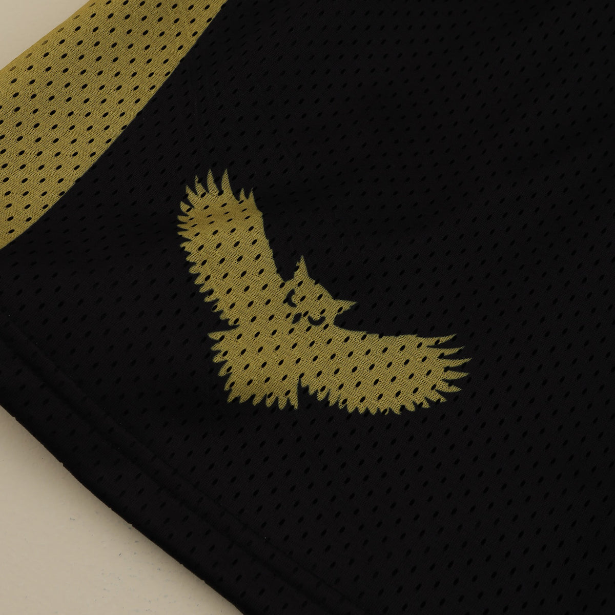 Owls Ultimate Mesh Shorts – owl emblem close-up
